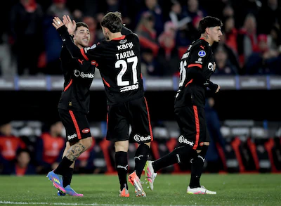 avellaneda-argentina-may-28-santiago-montiel-of-independiente-celebrates-with-teammate-diego-tarzia.webp