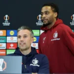 epa12583507-feyenoord-s-head-coach-robin-van-persie-and-player-quinten-timber-r-attend-a-press-confe.webp