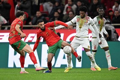 morocco-s-defender-03-noussair-mazraoui-and-mali-s-forward-21-gaoussou-diarra-compete-for-the-ball-d.jpeg