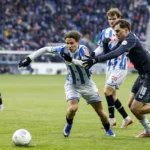 2026-01-11-12-24-54-heerenveen-l-r-oliver-braude-of-sc-heerenveen-leo-sauer-of-feyenoord-tijdens-de.webp