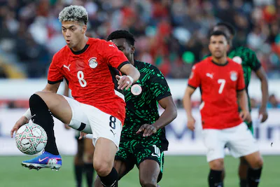 egypt-s-midfielder-8-emam-ashour-controls-the-ball-during-the-africa-cup-of-nations-can-third-place.webp