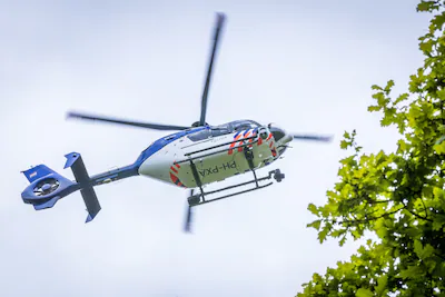 heerlen-een-politiehelikopter-doet-onderzoek-op-de-brunssummerheide-waar-twee-doden-zijn-gevonden-vo.webp