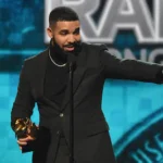 los-angeles-ca-february-10-drake-accepts-the-best-rap-song-award-for-god-s-plan-onstage-backstage-du.webp