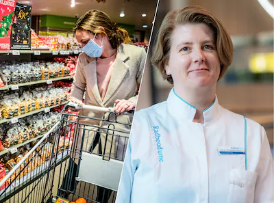 mierlo-een-vrouw-met-een-mondkapje-doet-boodschappen-in-een-supermarkt-vanwege-het-oplopende-aantal.webp