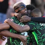 nigeria-s-forward-09-victor-osimhen-celebrates-his-goal-with-teammates-during-the-africa-cup-of-nati.webp