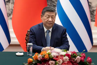 chinese-president-xi-jinping-looks-on-during-a-signing-ceremony-with-uruguayan-president-yamandu-ors.webp
