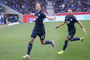 hoffenheim-s-dutch-midfielder-18-wouter-burger-l-celebrates-scoring-the-opening-goal-with-his-teamma.webp