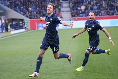 hoffenheim-s-dutch-midfielder-18-wouter-burger-l-celebrates-scoring-the-opening-goal-with-his-teamma.webp