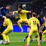 inter-milan-s-italian-midfielder-16-davide-frattesi-l-heads-the-ball-past-bodo-glimt-s-danish-forwar.webp
