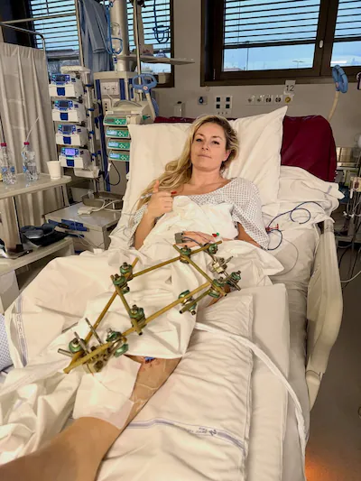 u-s-skier-lindsey-vonn-lies-in-a-hospital-bed-after-she-crashed-during-the-women-s-downhill-in-trevi.webp
