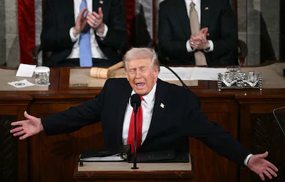 us-president-donald-trump-gestures-as-he-delivers-the-state-of-the-union-address-in-the-house-chambe.webp