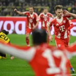 bayern-munich-s-german-midfielder-06-joshua-kimmich-celebrates-scoring-the-2-3-goal-with-his-teammat.webp