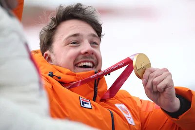cortina-d-ampezzo-italy-march-9-gold-medalist-jeroen-kampschreur-of-team-netherlands-poses-for-a-pho.webp