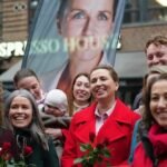 danish-prime-minister-and-leader-of-the-social-democrats-mette-frederiksen-centre-stands-with-party.jpeg