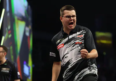 gian-van-veen-celebrates-after-winning-during-his-match-against-gerwyn-price-on-night-four-of-the-pr.webp