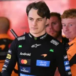 mclaren-s-australian-driver-oscar-piastri-c-looks-on-in-the-garage-during-the-third-practice-session.webp