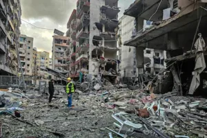 men-inspect-a-site-of-overnight-israeli-airstrikes-in-the-southern-suburbs-of-beirut-on-march-16-202.webp