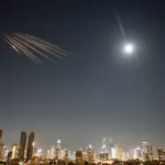 missiles-launched-from-iran-are-seen-in-the-sky-over-central-israel-thursday-march-5-2026-ap-photo-o.webp