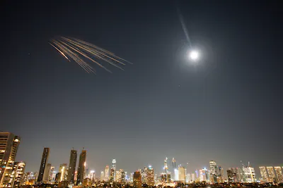 missiles-launched-from-iran-are-seen-in-the-sky-over-central-israel-thursday-march-5-2026-ap-photo-o.webp