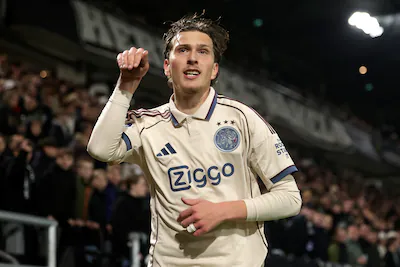 almelo-netherlands-april-11-mika-godts-of-ajax-celebrates-0-1-during-the-dutch-eredivisie-match-betw.webp