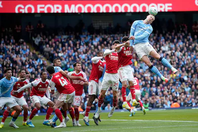 manchester-city-s-erling-haaland-heads-the-ball-during-the-english-premier-league-soccer-match-betwe.webp
