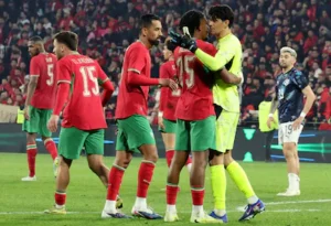 morocco-s-players-celebrate-after-winning-the-friendly-football-match-between-morocco-and-paraguay-a.webp