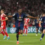 psg-s-ousmane-dembele-celebrates-after-scoring-his-side-s-third-goal-during-a-champions-league-semif.webp