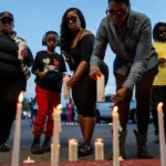 shreveport-louisiana-april-19-people-attend-a-candlelight-vigil-on-april-19-2026-in-shreveport-louis.webp