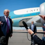 u-s-president-donald-trump-speaks-to-the-press-as-he-arrives-at-phoenix-sky-harbor-international-air.webp