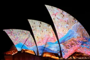 sydney-australia-may-22-the-sails-of-the-sydney-opera-house-are-illuminated-with-lights-on-the-openi.webp