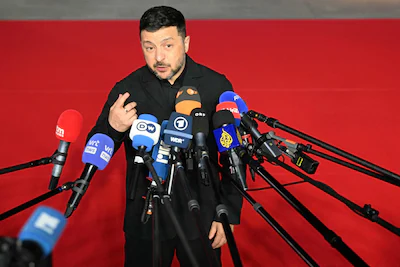 topshot-ukraine-s-president-volodymyr-zelensky-speaks-to-media-upon-his-arrival-ahead-of-an-informal.webp