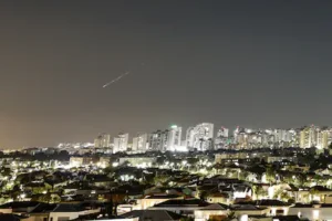 a-streak-of-light-illuminates-the-sky-during-a-missile-attack-from-iran-towards-israel-as-seen-from.webp