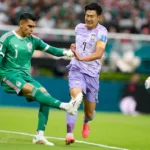 mexico-goalkeeper-raul-rangel-1-kicks-the-ball-as-south-korea-s-son-heung-min-7-runs-in-during-the-w.webp
