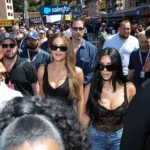 monte-carlo-monaco-june-06-khloe-kardashian-and-kim-kardashian-walk-in-the-paddock-during-qualifying.webp