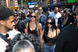 monte-carlo-monaco-june-06-khloe-kardashian-and-kim-kardashian-walk-in-the-paddock-during-qualifying.webp