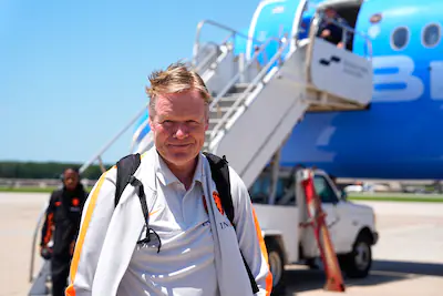 netherlands-head-coach-ronald-koeman-arrives-for-the-world-cup-soccer-tournament-in-kansas-city-mo-t.webp
