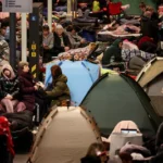 people-take-shelter-inside-a-metro-station-during-a-russian-air-strike-amid-russia-s-attack-on-ukrai.webp