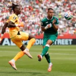 toronto-ontario-june-26-mory-diaw-23-of-senegal-and-ali-alhamadi-9-of-iraq-compete-for-the-ball-duri.webp