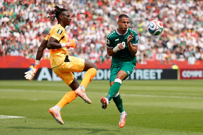 toronto-ontario-june-26-mory-diaw-23-of-senegal-and-ali-alhamadi-9-of-iraq-compete-for-the-ball-duri.webp