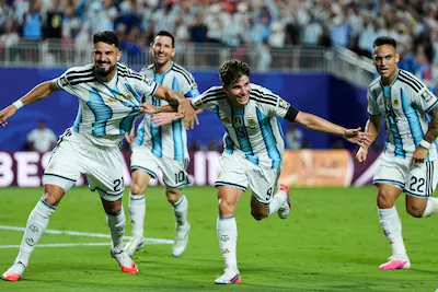 argentina-s-julian-alvarez-9-celebrates-after-scoring-his-side-s-second-goal-with-from-left-jose-man.webp