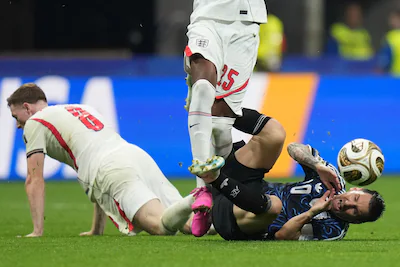 argentina-s-lionel-messi-10-is-stopped-by-england-s-elliot-anderson-8-during-the-world-cup-semifinal.webp