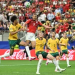 egypt-s-defender-05-ramy-rabia-c-and-australia-s-defender-25-lucas-herrington-l-jump-for-the-ball-du.webp