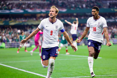 england-s-forward-09-harry-kane-celebrates-scoring-his-team-s-third-goal-with-england-s-midfielder-1.webp