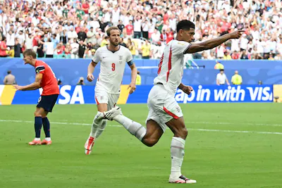 england-s-midfielder-10-jude-bellingham-celebrates-scoring-his-team-s-first-goal-during-the-2026-wor.webp